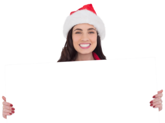 Smiling brunette in santa hat showing white poster