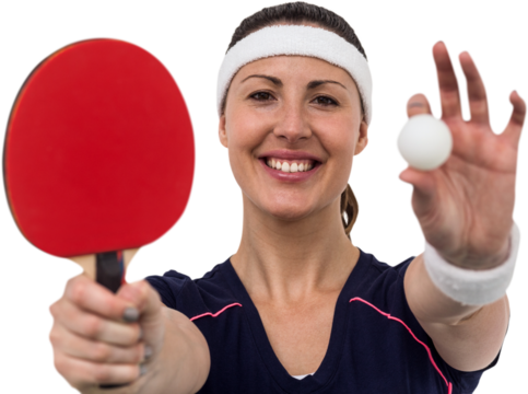Female athlete holding table tennis paddle and ball