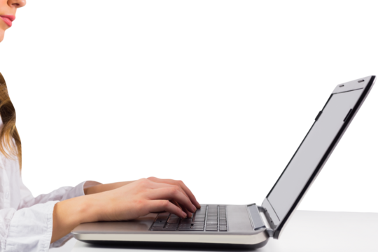 Woman typing on her laptop