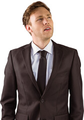 Young businessman thinking and looking up