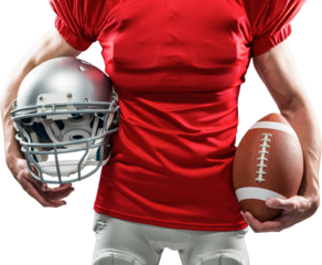 Midsection of American football player holding helmet and ball