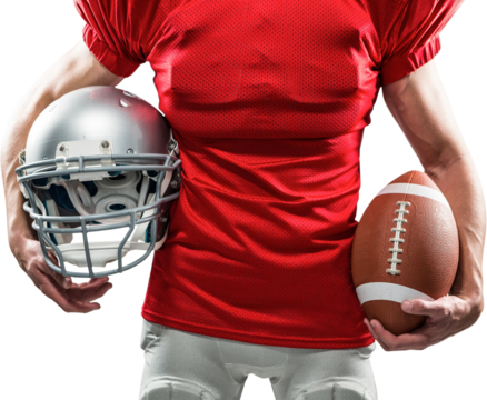 Midsection of American football player holding helmet and ball