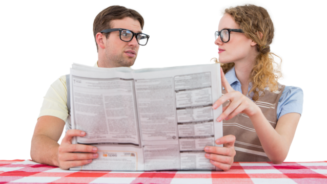 Geeky hipster couple reading newspaper