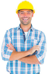 Cheerul handyman standing arms crossed