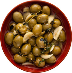 Olives with spice and herbs in bowl