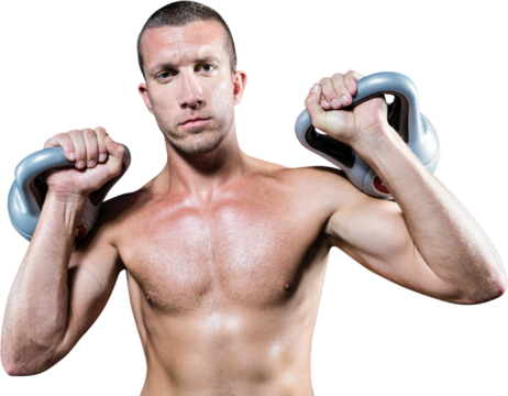 Confident shirtless athlete holding kettlebell