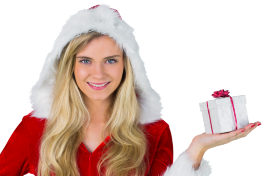 Pretty girl in santa outfit holding gift