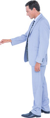 Fototapeta premium Businessman touching invisible screen on white background