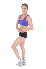 Strong blonde posing and looking at camera