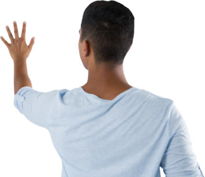 Man pretending to touch an invisible screen against white background