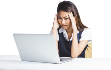 Nervous businesswoman using a laptop