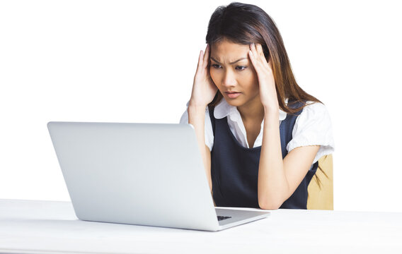 Nervous businesswoman using a laptop