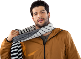 Portrait of young man wearing scarf posing against white background