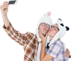 Geeky hipster couple taking selfie with smart phone