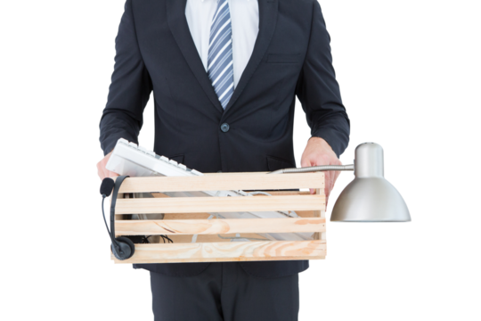 Businessman holding box of his things - Powered by Adobe