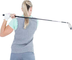 Pretty blonde playing golf