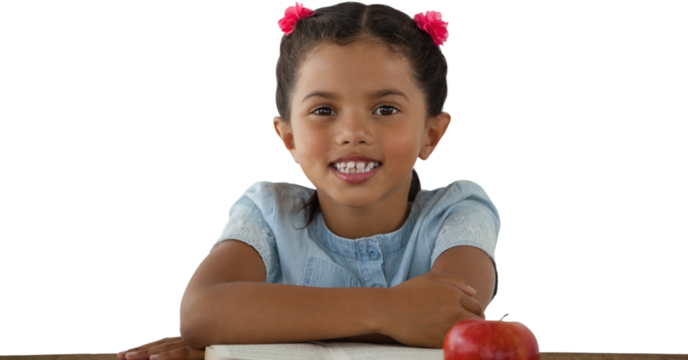 Smiling girl sitting at desk