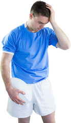 Disappointed rugby player holding his head