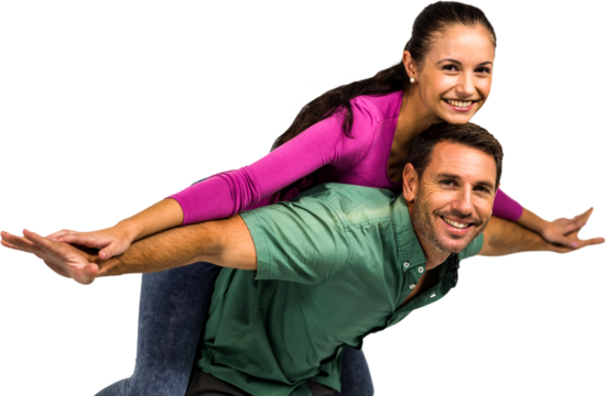 Happy man piggybacking girlfriend