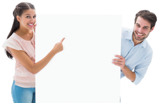 Attractive young couple smiling and holding poster - Powered by Adobe