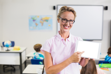 Female teacher pointing over digital tablet