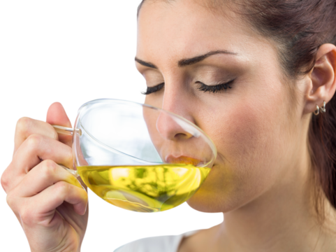 Beautiful woman drinking herbal tea - Powered by Adobe