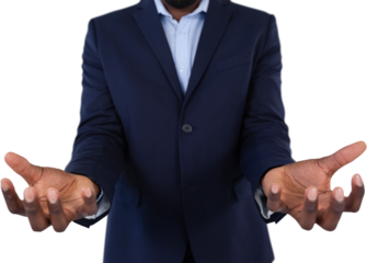 Midsection of businessman in suit showing his hands against white background