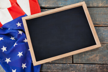 High angle view of American flag with chalkboard
