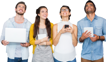 Smiling business people holding technology while looking up