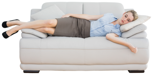 Attractive peaceful businesswoman sleeping lying on couch