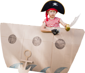 Portrait of boy in pirate costume against white backgorund