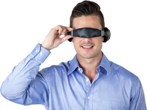 Smiling handsome man wearing virtual reality headset