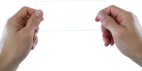 Cropped hands of man holding futuristic mobile phone