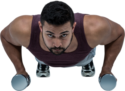 Muscular man doing push ups with dumbbells - Powered by Adobe