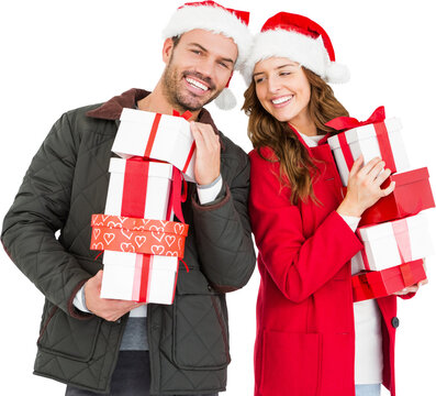 Happy young couple holding gifts