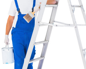Handyman with paint can and brush climbing ladder