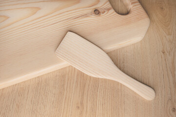 Fototapeta na wymiar Wooden kitchen utensils. Spatula. Kitchen wooden tools and kitchenware.