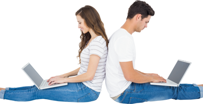 Couple sitting on floor back to back using laptop - Powered by Adobe