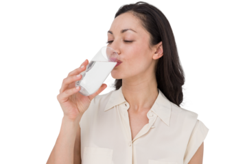 Pretty brunette drinking water 