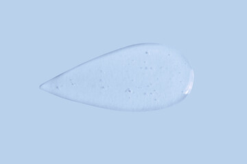texture of a large smear of transparent gel on a blue background