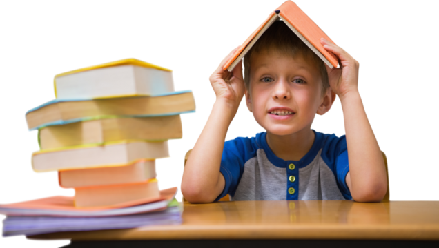 Cute boy with book on head