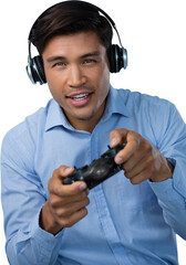 Portrait of smiling young businessman playing video game