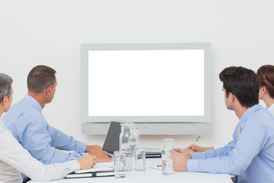 Business team watching whiteboard during a meeting