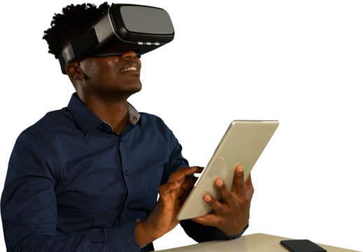 Male African-american use virtual reality headset and digital tablet