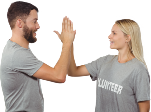 Smiling volunteer doing high five in office