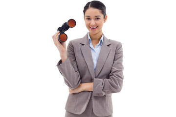 Portrait of a businesswoman holding binoculars