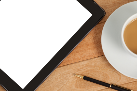 Digital tablet with pen and cup of tea - Powered by Adobe