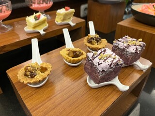 Catering service background with sliced cake on guests table in restaurant at event party.