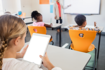 Girl looking at digital tablet