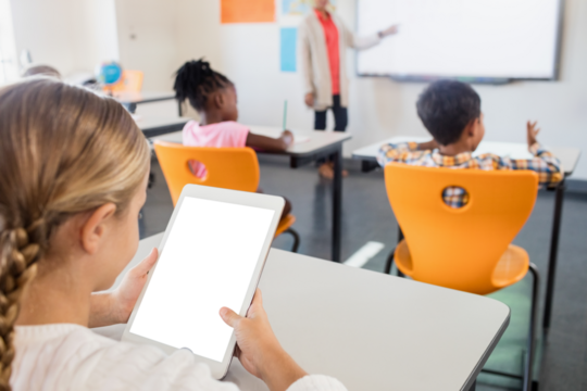 Girl looking at digital tablet